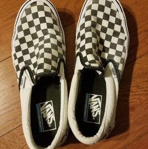 Black and white checkered slip on Vans